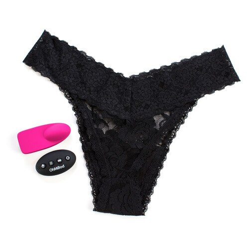 An overhead image of the Club Vibe 3.OH slim line remote control panty vibe and its remote control next to the black lace thong they come with.