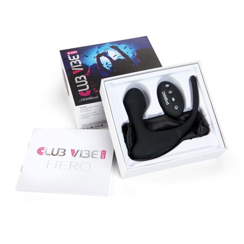 An image of the Club Vibe Hero and remote in their open box with the manual to the left.