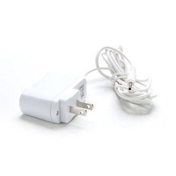 An image of a coiled white wall-outlet charging cable on a white background.