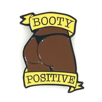 Front image of a pin with a black booty and the words Booty Positive on a white background