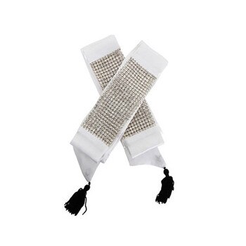 A set of white Juliette cuffs with crystals and tassels.