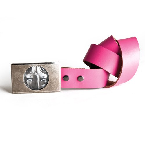 An image of the OhMiBod Lovebuckle pink belt with a buckle that contains a condom and a pink leather belt strap coiled to the right.