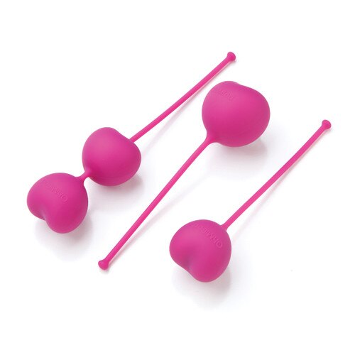 An image of three Lovelife Flex pink silicone Kegel weights with retrieval cords lying on a white background. There is a large weight, a smaller weight, and two weights on the same string.