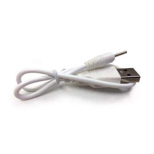 An image of a coiled white USB charging cable on a white background. This is the post-style charging cable for older Krush toys, not the magnetic iteration.