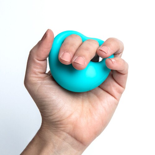 An image of Lovelife Rev being held in a hand with buff painted nails. The image showcases the easy grip design making Rev accessible to those with dexterity challenges.