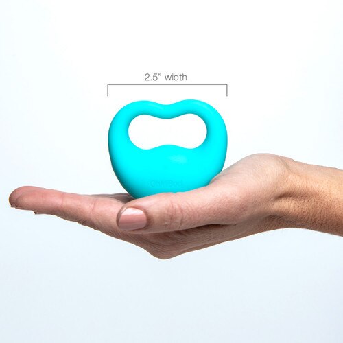 An image of Lovelife Rev standing upright in the extended palm of an outreached hand. Above is a measurement showing its total width of 2.5 inches.
