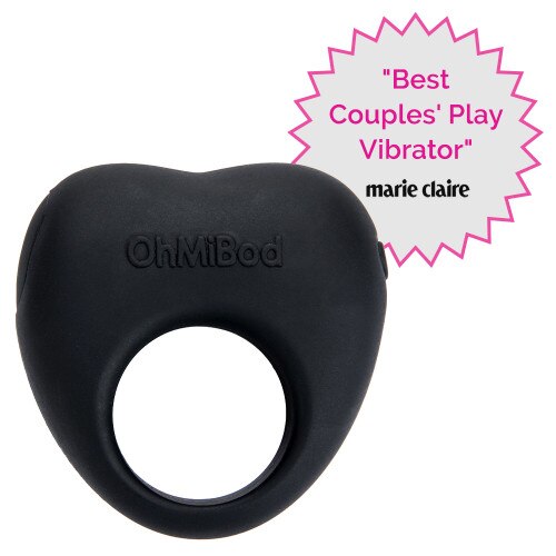 The Lovelife Share couples vibe on a white background. It is black and heart shaped with a center opening. Beside it is a badge that reads "best couples play vibrator" and the logo of marie claire.