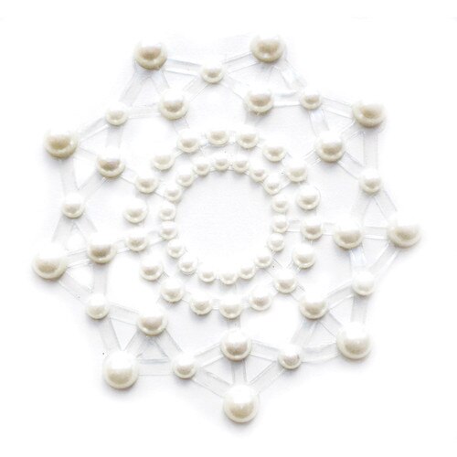 An image of a pearl rhinestone nipple pasty in a starburst shape.