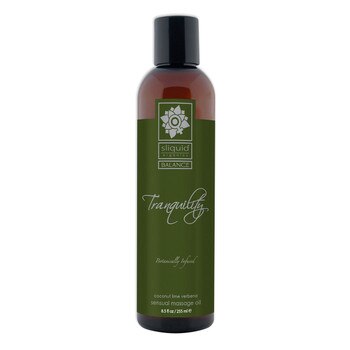 A tall brown 8.5 fluid ounce bottle of Tranquility massage oil by sliquid in coconut lime verbena. The bottle has a dark green label.