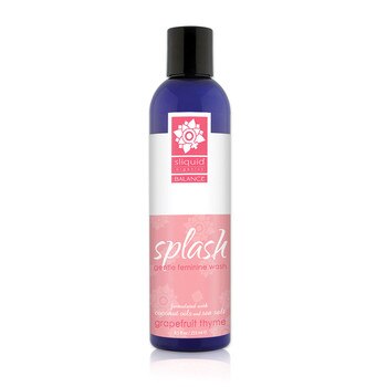 A tall dark blue 8.5 ounce bottle of Sliquid's Splash gentle feminine wash in grapefruit thyme. The label is white and pink, and the bottle has a black cap.