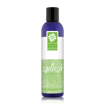 A tall dark blue 8.5 ounce bottle of Sliquid's Splash gentle feminine wash in honeydew cucumber. The label is white and green, and the bottle has a black cap.