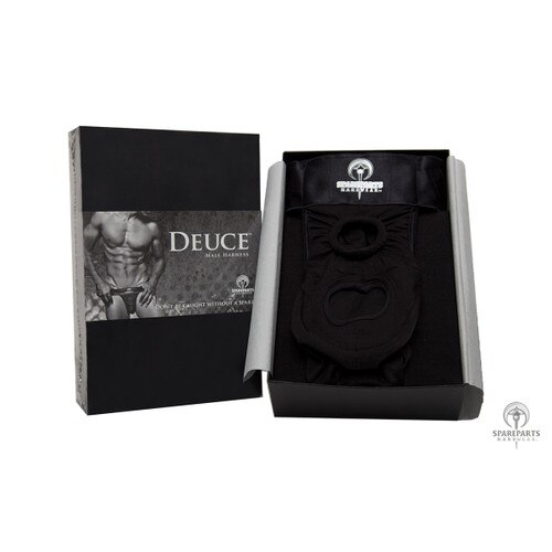 An image of the black Deuce male harness in its packaging