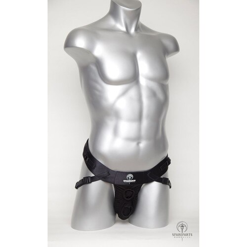 An image of a silver mannequin wearing the black Deuce harness with two openings.