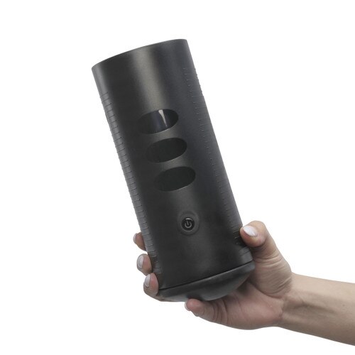 Front View of a hand holding the Kiiroo Titan on a white background