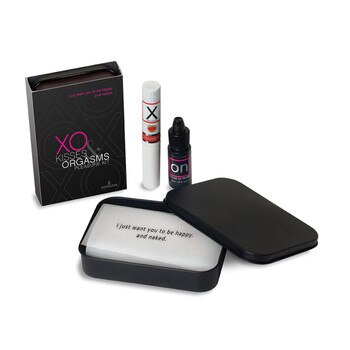 An image of the items in the XO kisses and orgasms pleasure kit arranged on a white background.